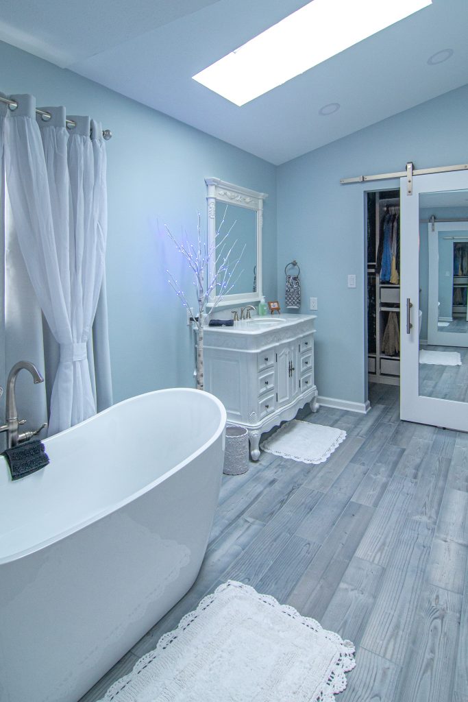 Traditional Style Robinson Township Bathroom using Warm Tones on Walls and Floor