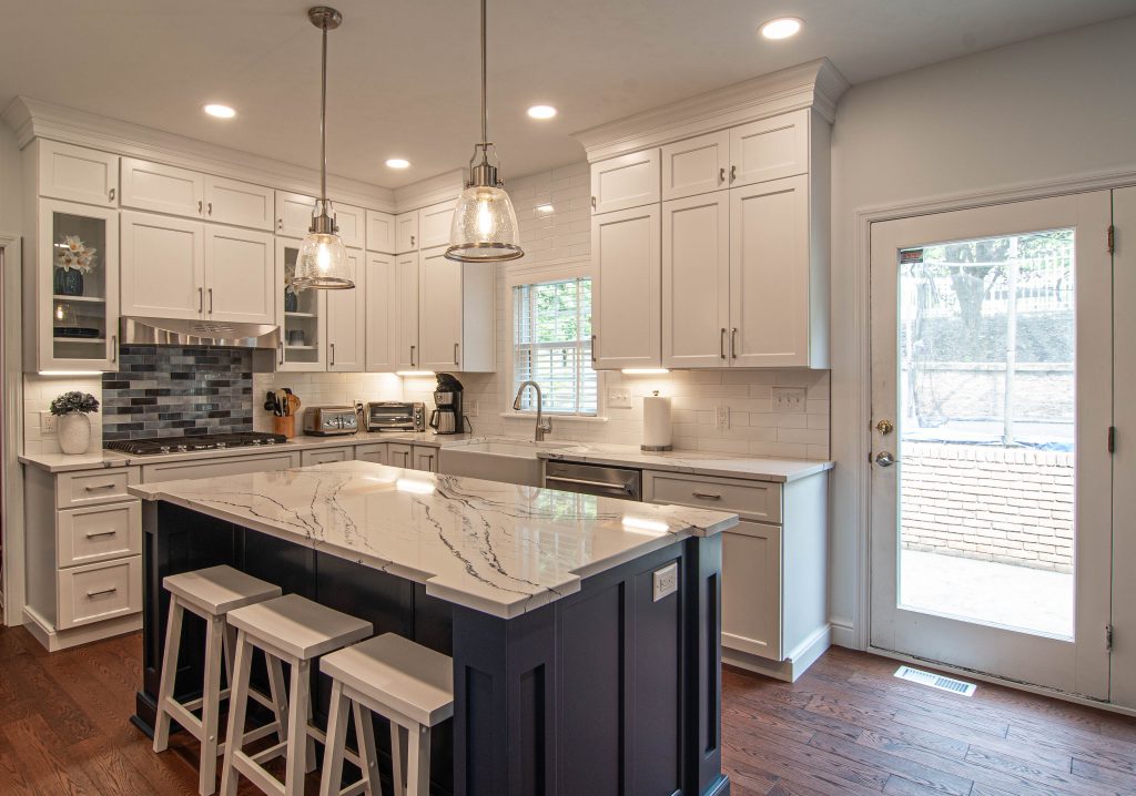 Picture of a traditional-style two-tone kitchen in Cranberry, PA, that uses the shaker door style and maximizes space by double-stacking cabinets.