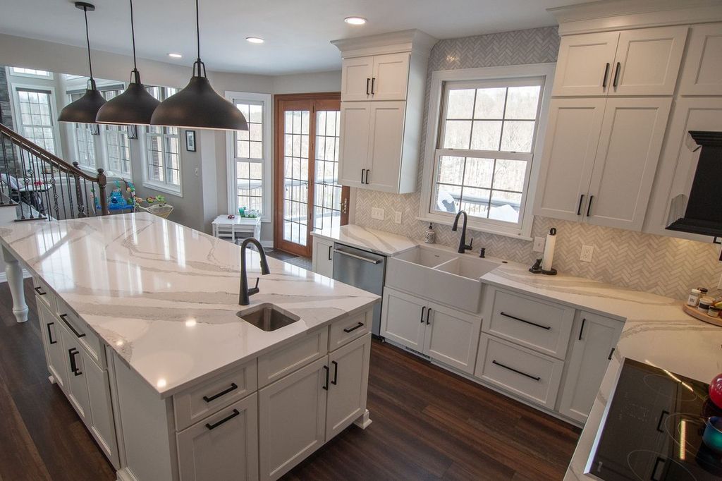 Picture of a traditional-style Upper St. Clair, PA, kitchen using warm tones to achieve an open floor concept.