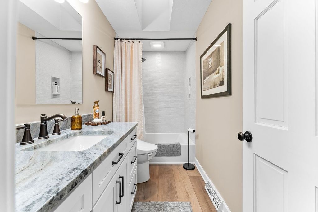Modern Neutral Gibsonia Bathroom with Luxurious Fixtures Creating a Serene Ambiance, Perfect for Relaxation.
