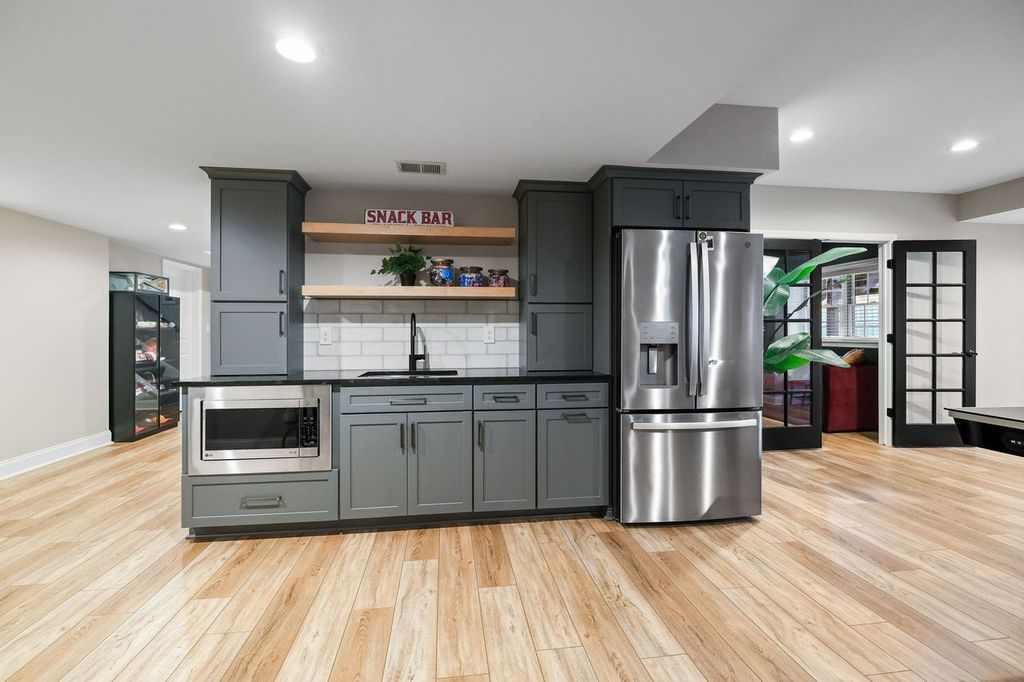 Modern O’Hara Township Game Room Creates an Entertaining Space for Leisure Activities.