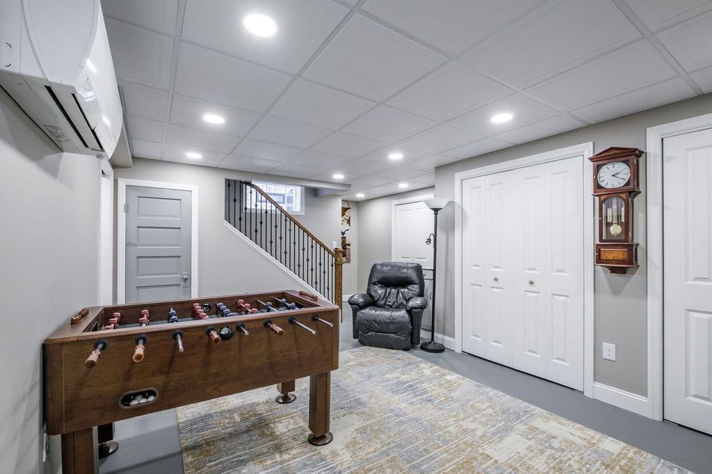 Cozy and Modern South Park Basement Combining a Multi-Purpose Living and Fun Space Perfect for Entertaining Your Family and Friends