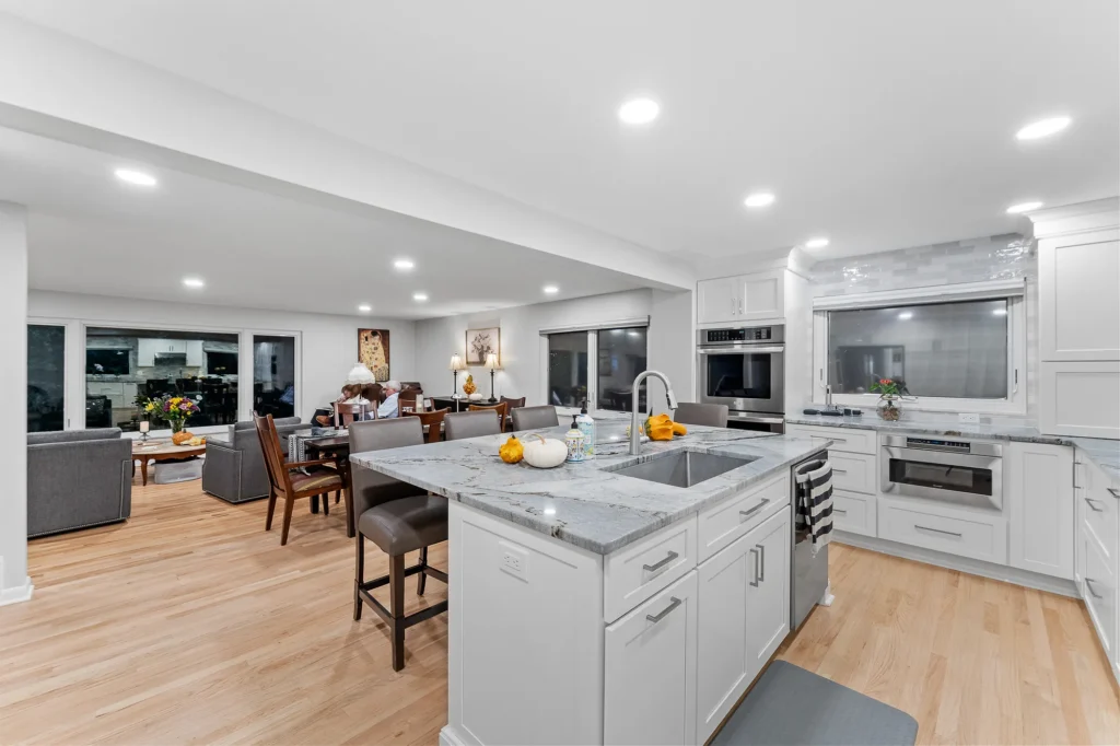 Modern Transitional Mt. Lebanon Kitchen with White Shaker Cabinetry, Sleek Hardware and Custom Built-ins Introduces a Contemporary Edge with a Hint of Sophistication.