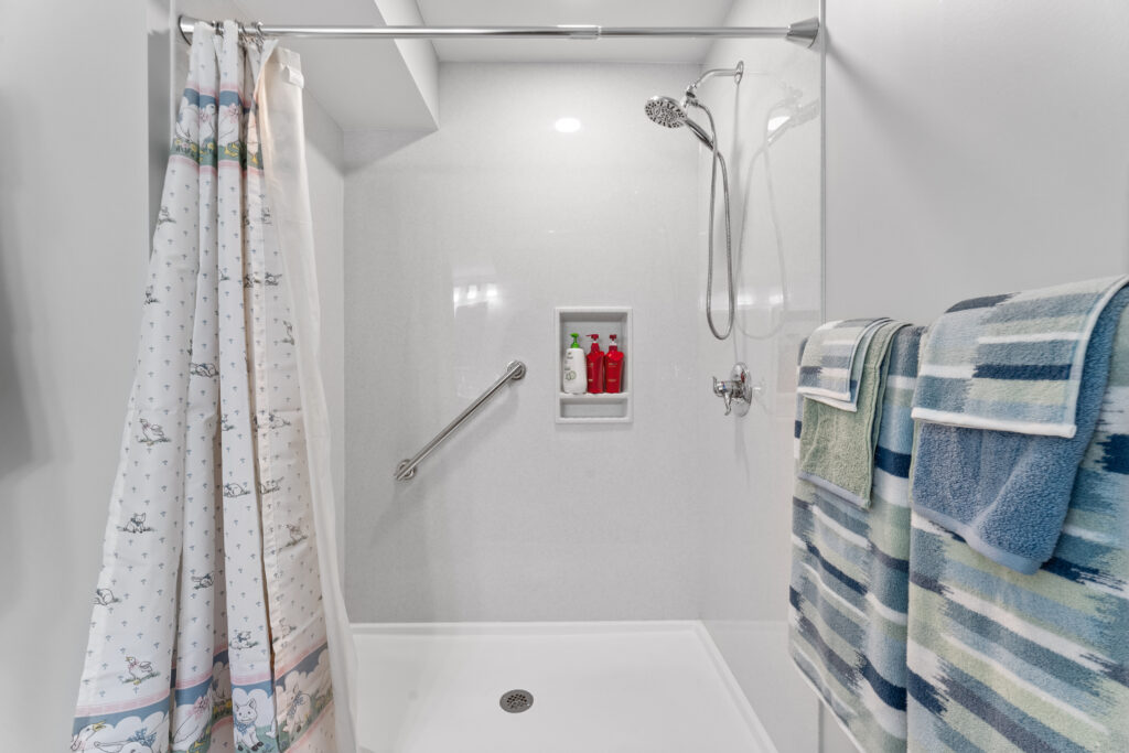 Contemporary Canonsburg Basement and Kitchenette Boasts a Warm Living Space for That Cozy Retreat Feel.