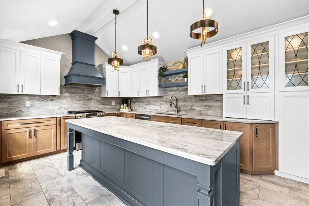 Contemporary white kitchen with island and pendant lighting