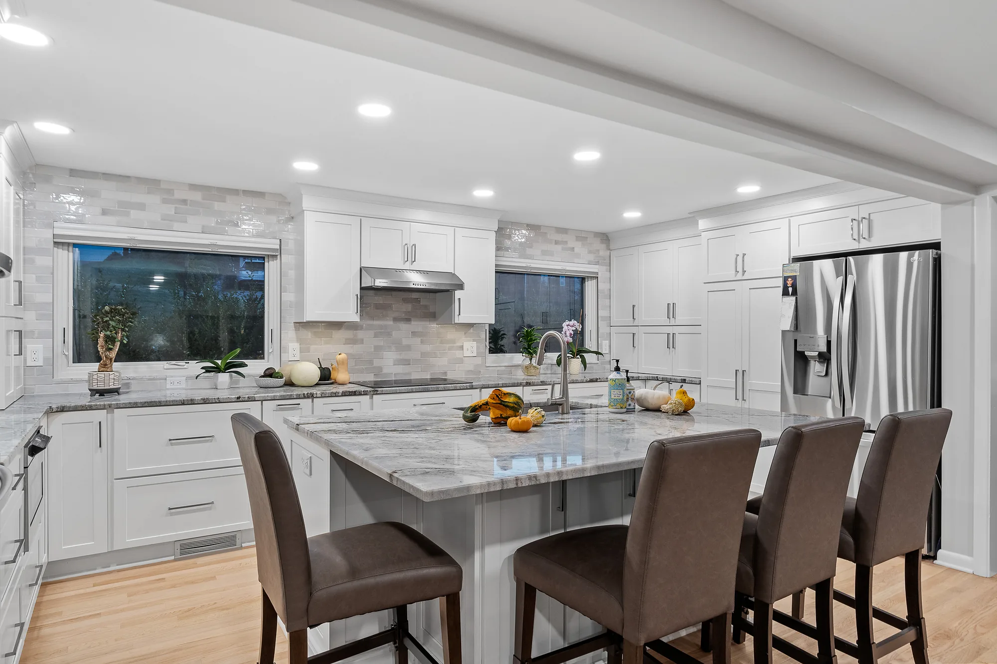 Modern Transitional Mt. Lebanon Kitchen with White Shaker Cabinetry, Sleek
Hardware and Custom Built
-
ins.