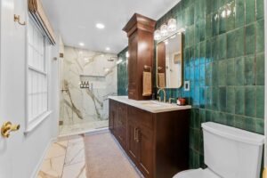 This Franklin Park Bathroom Features a Sophisticated and Rich Design with a Balanced Blend of Textures and Color