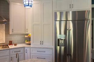Traditional Style Ross Township Kitchen Using Shaker Doors with White Painted Finish on Island.