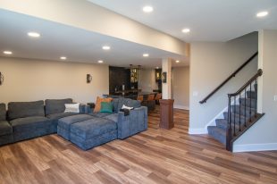 Traditional finished Murrysville Basement using Warmer Tones throughout.