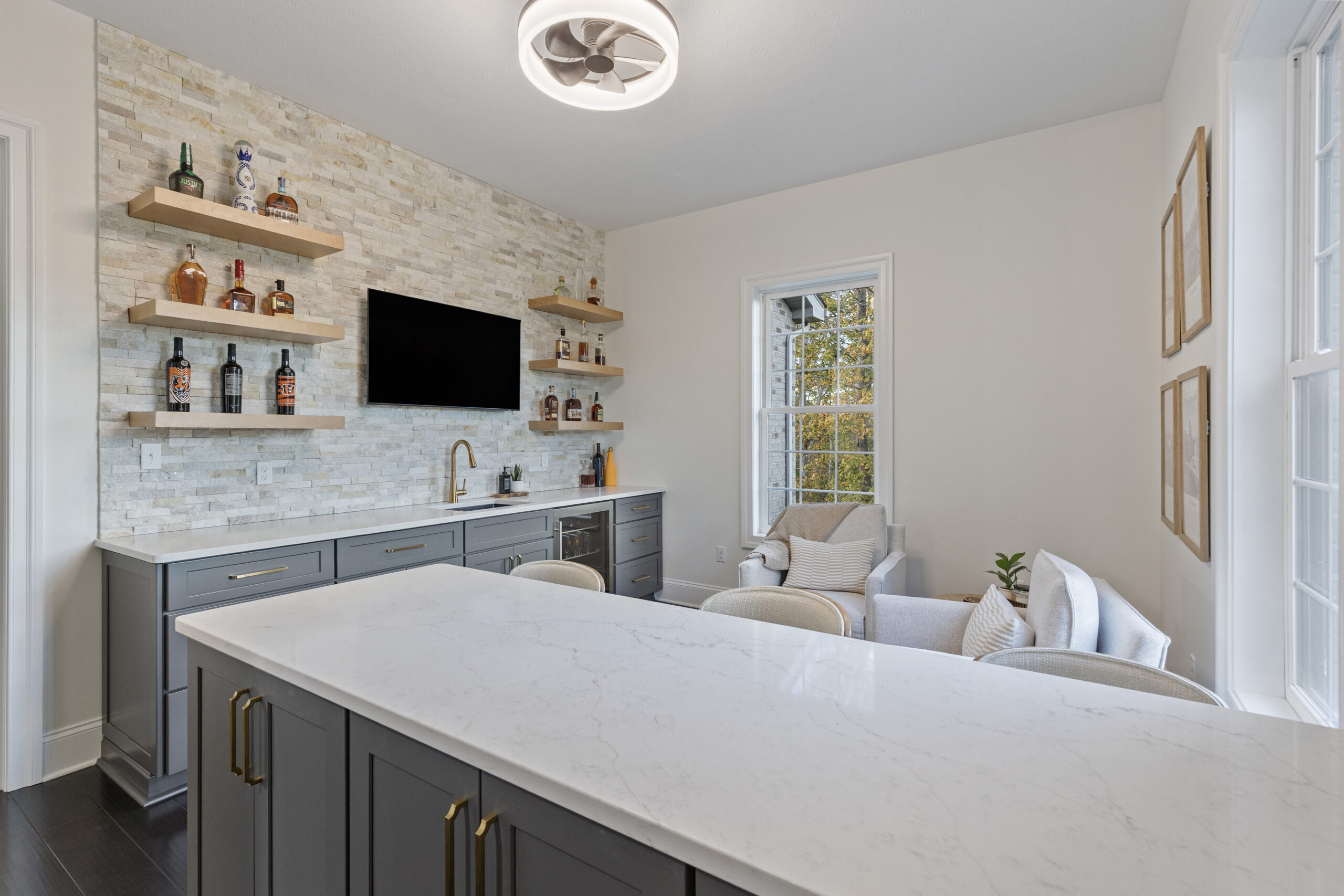 Custom Venetia Wine Room Featuring a Modern Minimalist Design with Floor-to- Ceiling Metal Wine Racks and Refrigeration and Climate Controlled System Perfect for Intimate Wine Tasting Parties